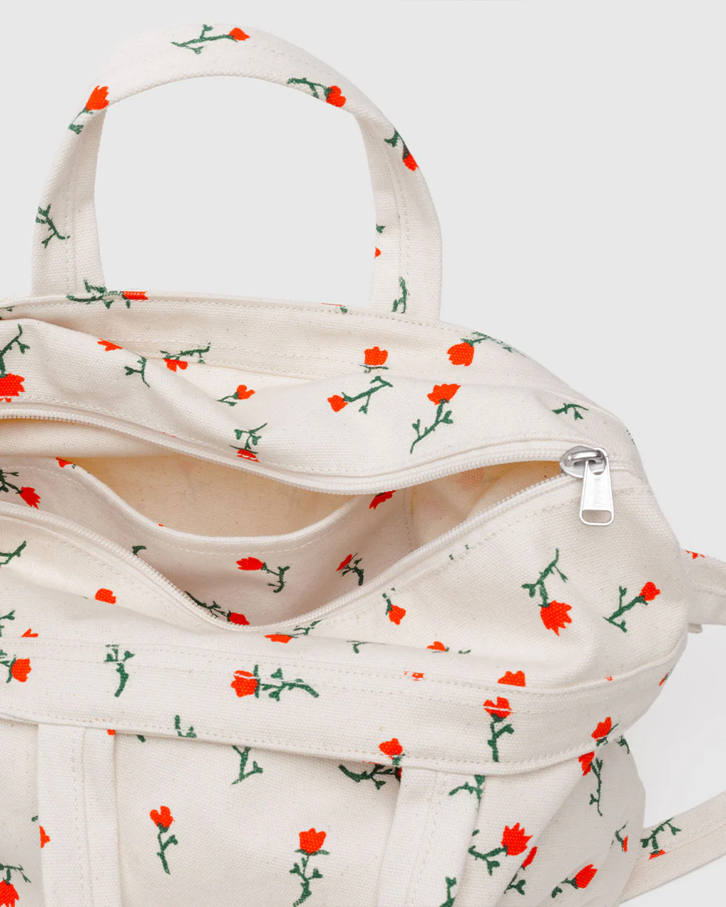 124-horizontal-zip-duck-bag-painted-wildflower-1.webp