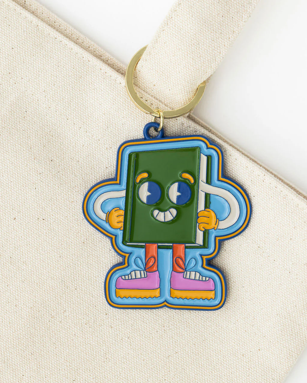 241-enamel-keychain-book-man-1.webp