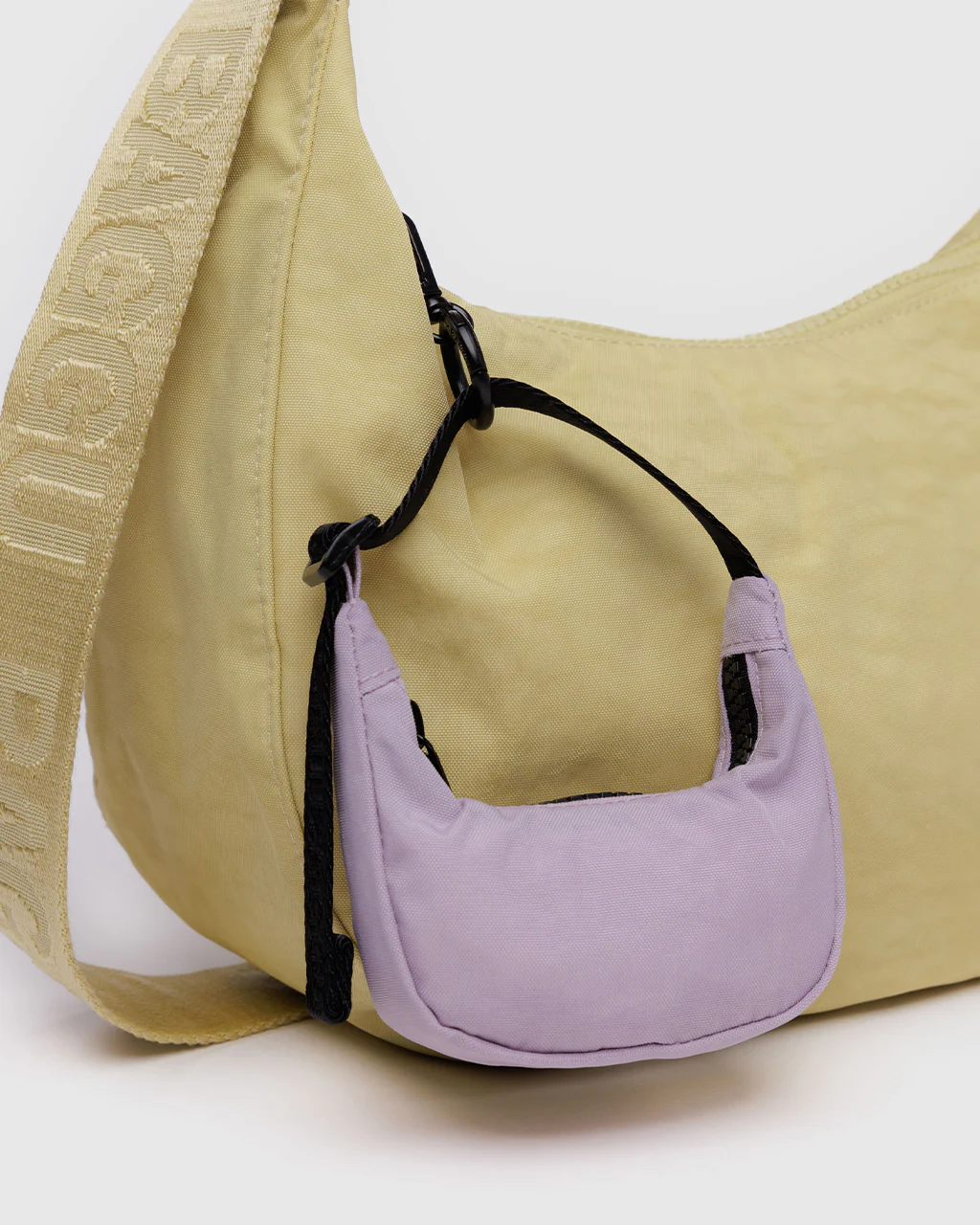 281-crescent-bag-charm-dusty-pink-1.webp