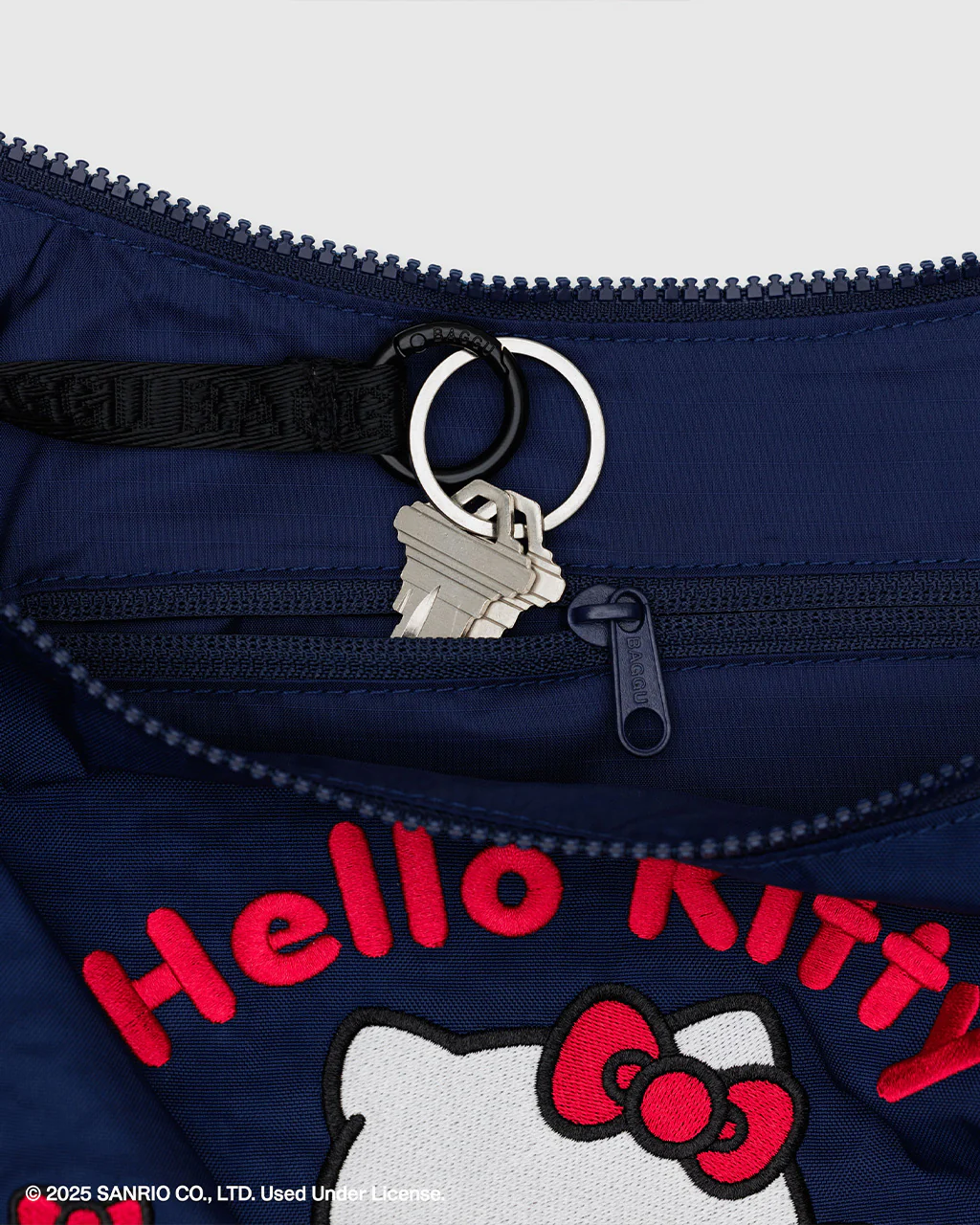 341-medium-nylon-crescent-bag-w-key-leash-embroidered-hello-kitty-teddy-1.webp