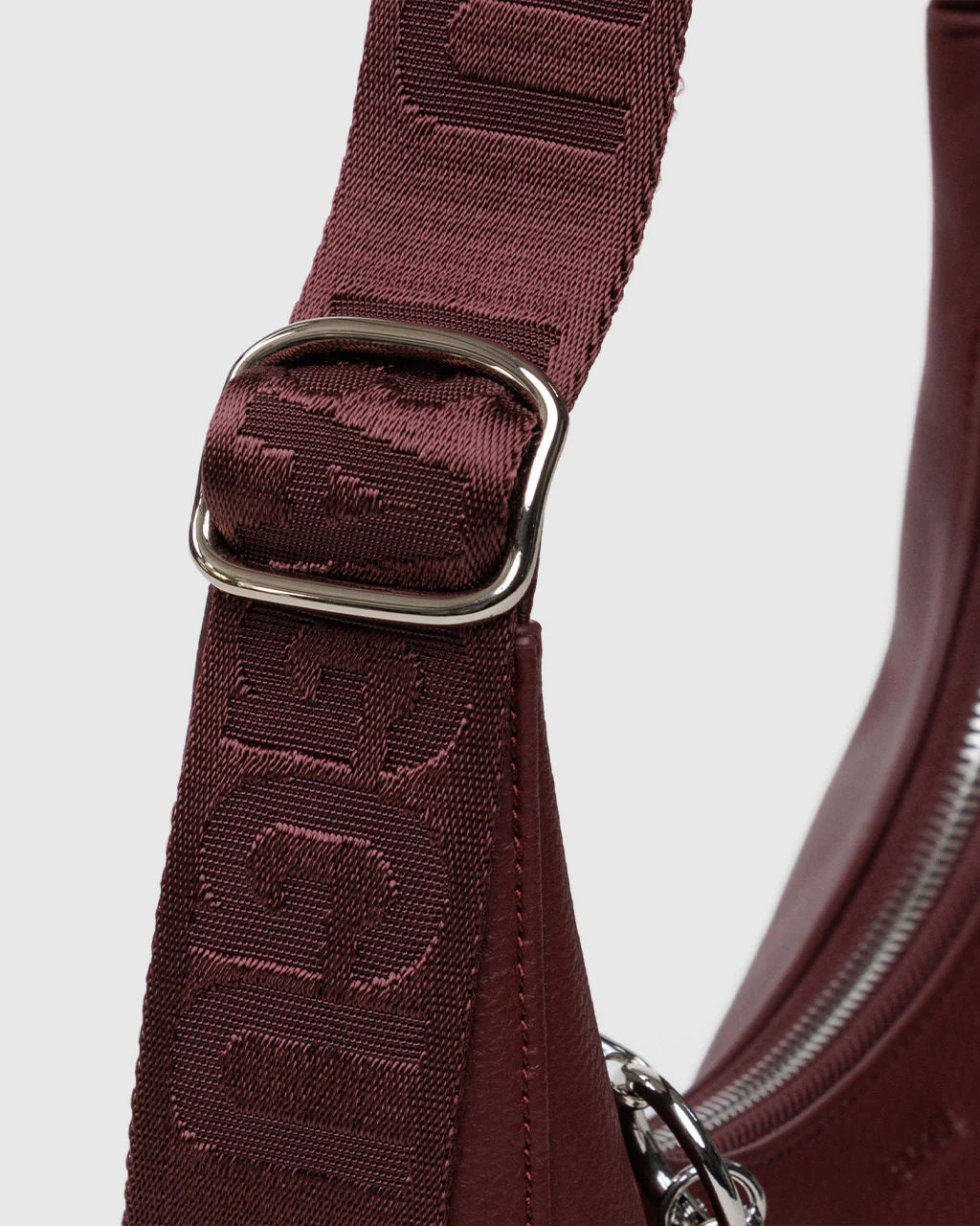 447-small-recycled-leather-crescent-bag-mahogany-1.webp
