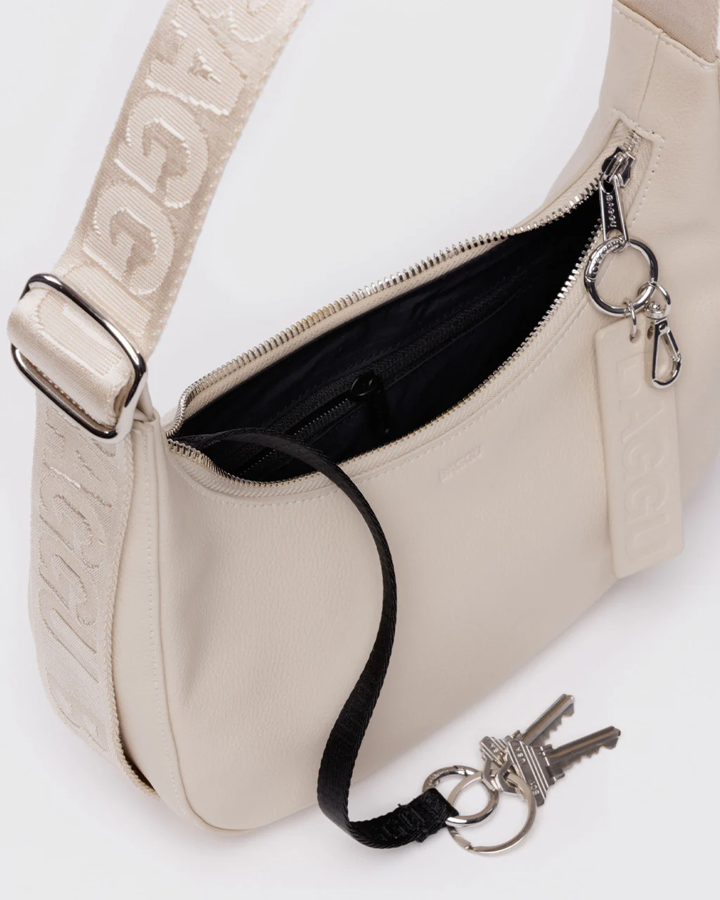 613-small-recycled-leather-crescent-bag-stone-1.webp