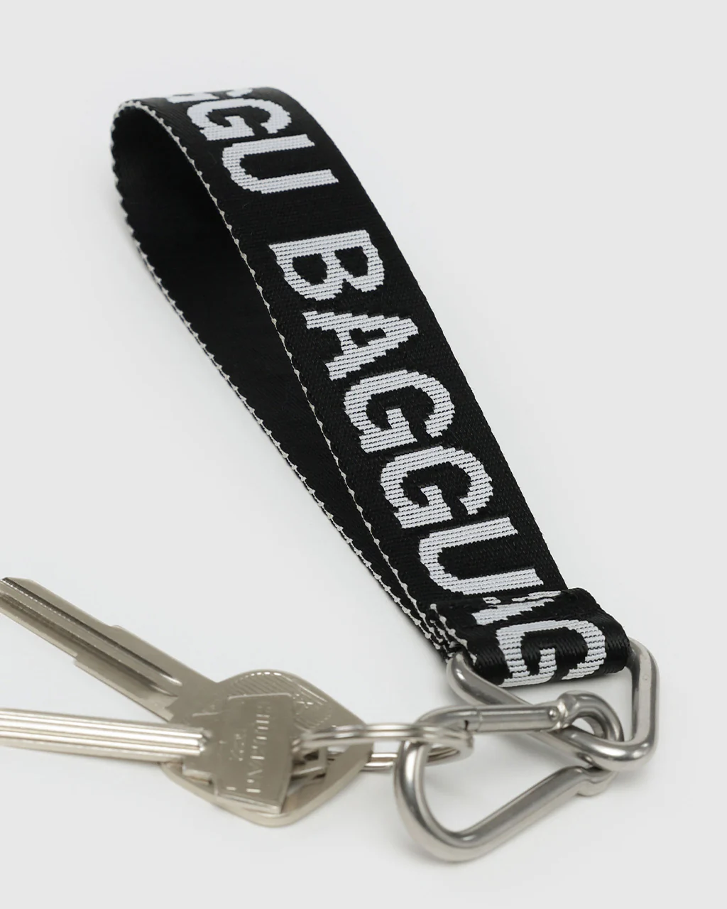 63-logo-keychain-black-and-white-1.webp