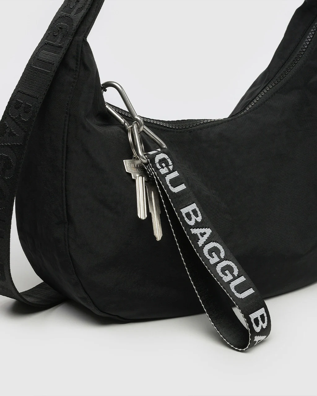 63-logo-keychain-black-and-white-1.webp