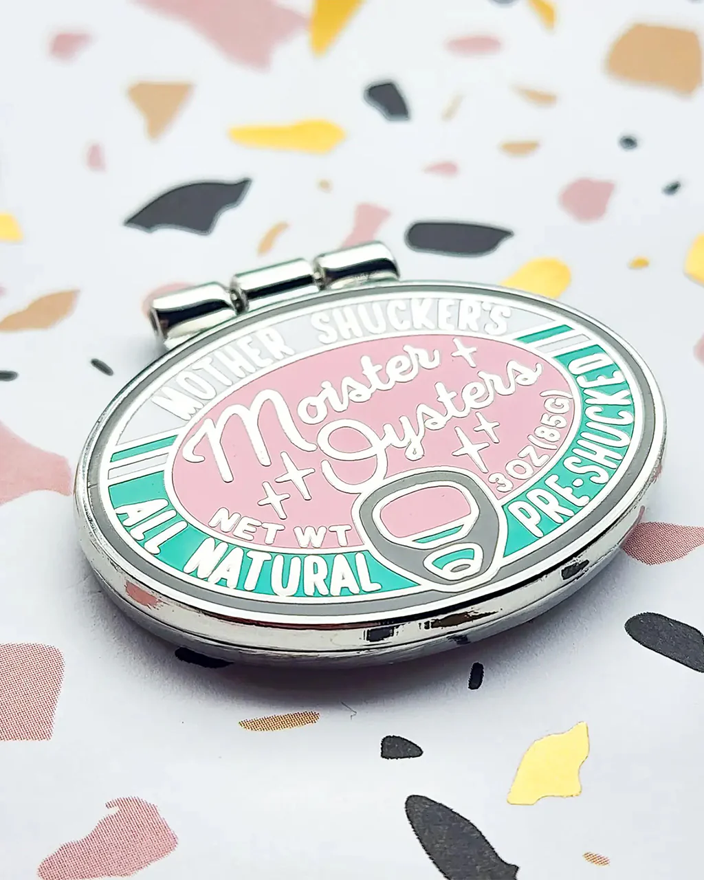999-tinned-oysters-enamel-pin-1.webp